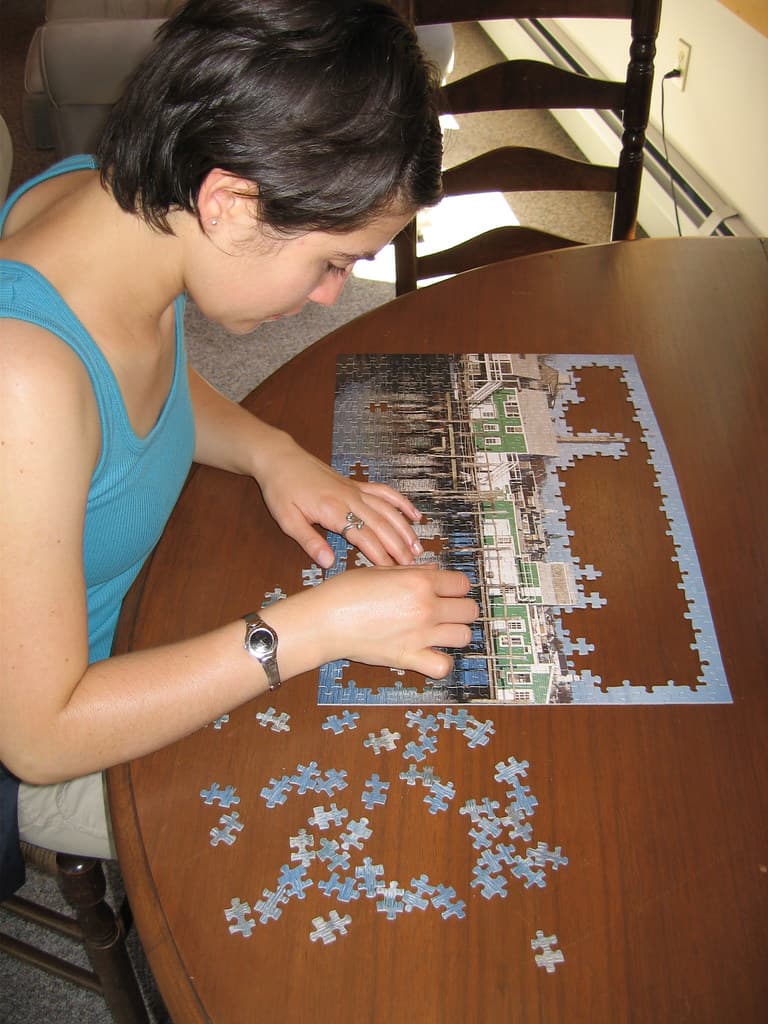 Assembling custom photo puzzle.