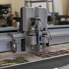 Industry leading cutter cutting custom photo jigsaw puzzles.